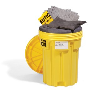 Yellow spill kit container with absorbent pads exposed for spill cleanup