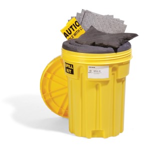 Yellow spill kit container with absorbent pads exposed for spill cleanup